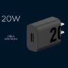 A black USB wall charger with "20W" written on its side is displayed against a dark blue background. The charger has a single USB-A port and is described with the text "USB-A: 20W QC3.0" below the "20W" label, indicating it supports 20W Quick Charge 3.0. The charger features two prongs for plugging into an electrical outlet.