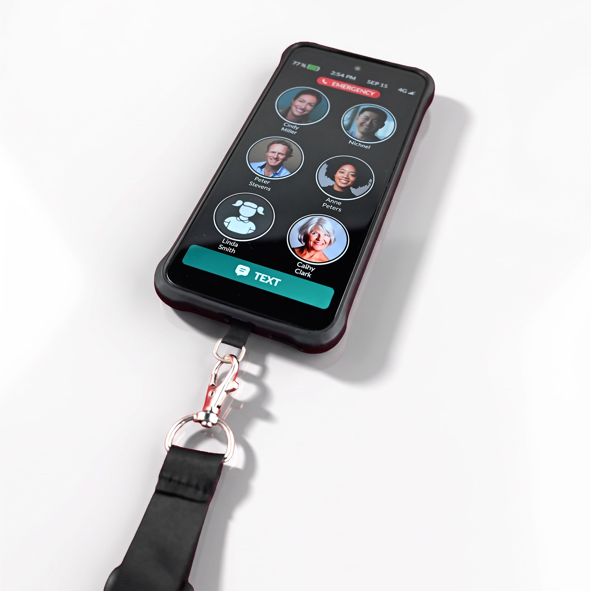RAZ Memory Cell Phone in a black protective case with the lanyard clipped to the bottom, showing the contact photo home screen.