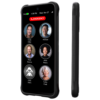 The RAZ Memory Cell Phone is displayed inside the "Memory Cell Phone Rugged Protective Case Blocking Buttons." The phone screen shows six large contact buttons with names and photos—Cindy Miller, Michael, Peter Stevens, Anne Peters, Linda Smith, and Cathy Clark—along with a red "EMERGENCY" button at the top. The side view of the phone highlights the case’s textured grip and button-blocking design, which helps prevent accidental presses. The rugged case is built for durability and protection, making it ideal for seniors or individuals with cognitive impairments.