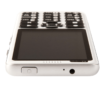 A close-up view of the top of the SmartVision 3, lying flat on a surface, showing its power button and earbuds port.