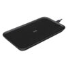 A black wireless charging pad with a minimalistic design, connected via a cable
